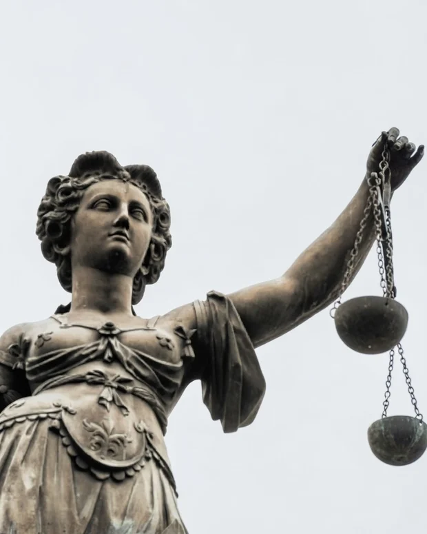 Lady Justice statue representing legal advocacy